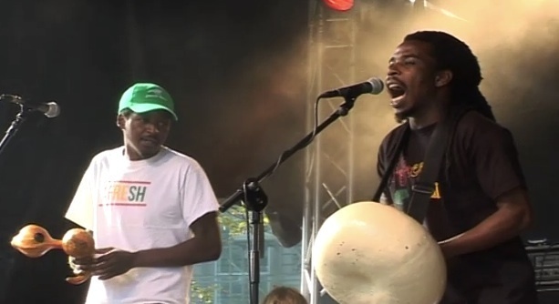 Timpeall an Domhain i mBéal Feirste